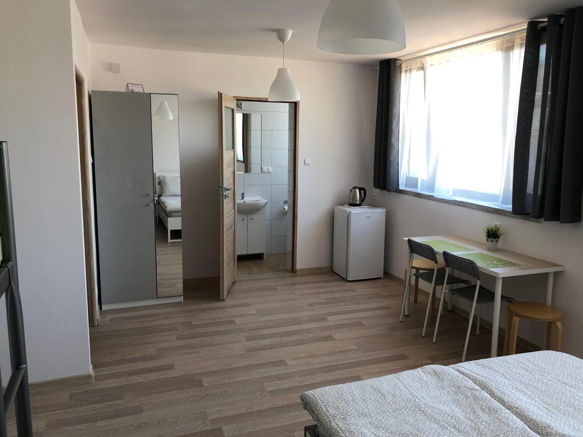 Appartement Zefir Pokoje à Unieście Extérieur photo